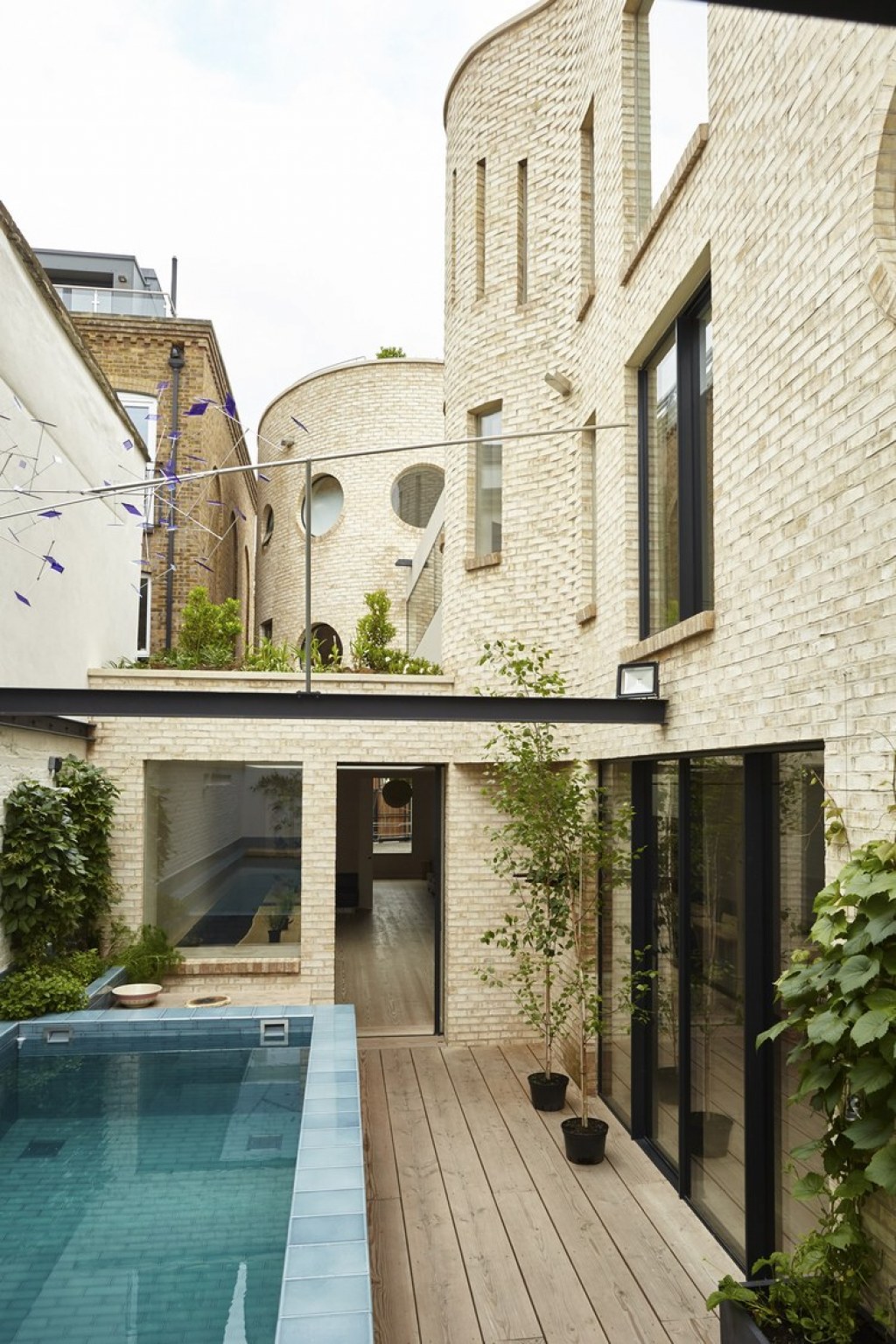 The Round House / Rear facade and pool