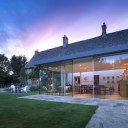 Contemporary Extension / Evening view from the garden