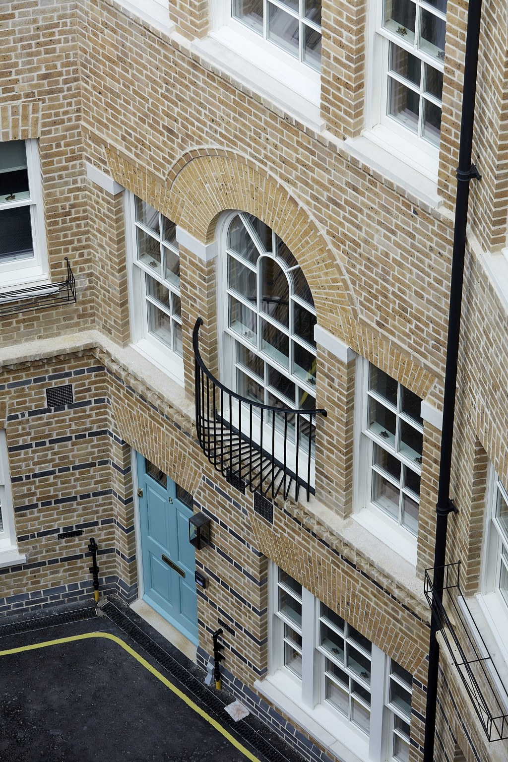 Replacement homes on Dean's Mews, London / Deans' Mews