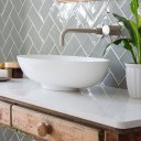 Detached Family Home, North Oxford / Bathroom detail showing tiling and reclaimed wash hand basin vanity unit