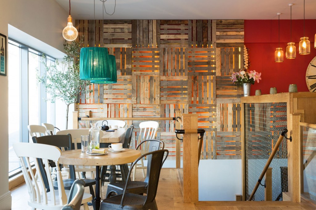 The Oxford Wine Cafe, Jericho / Cafe area, showing back wall clad in reclaimed wooden palettes