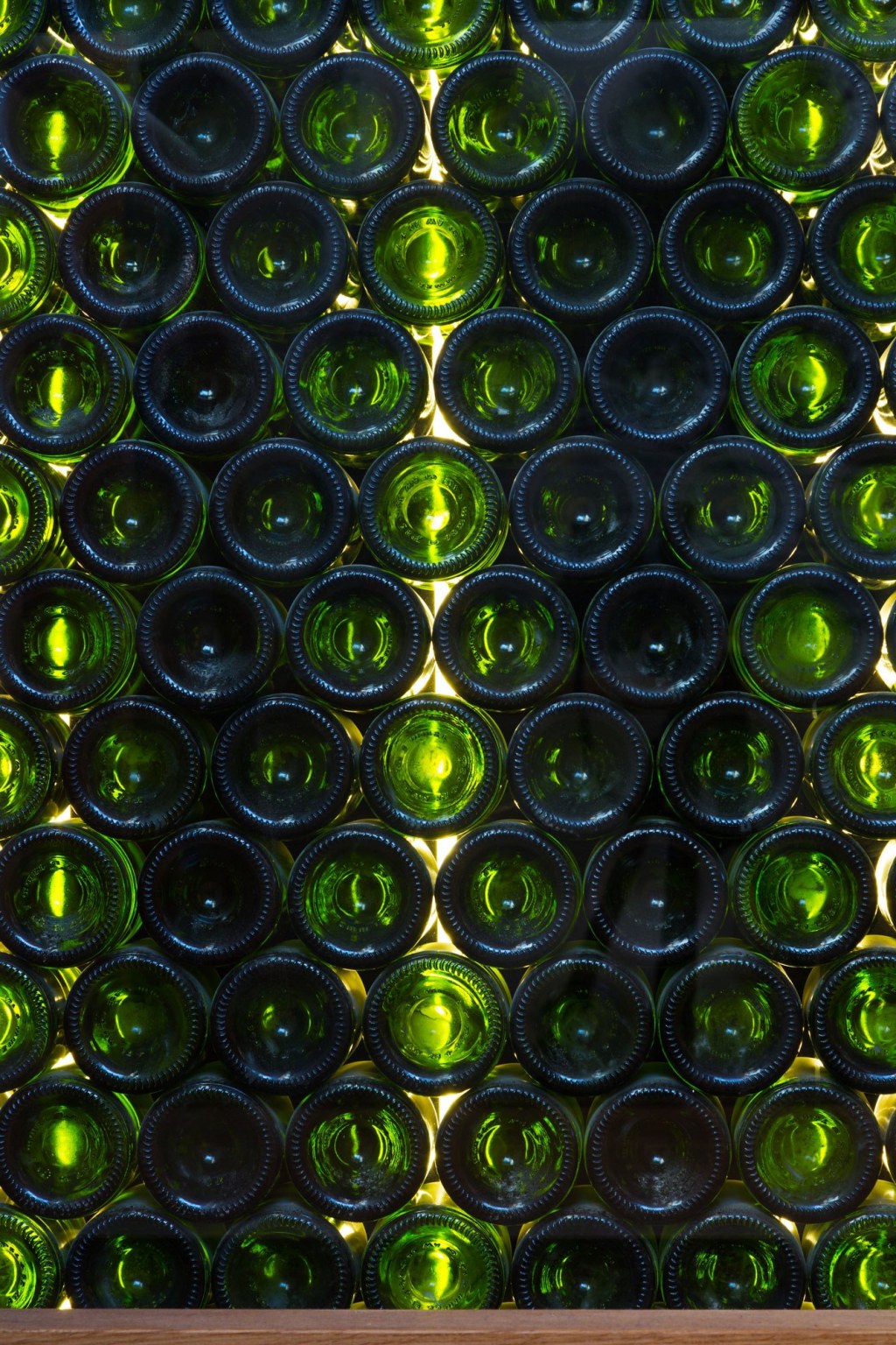 The Oxford Wine Cafe, Jericho / Detail showing recycled glass wine bottle wall behind staircase to basement