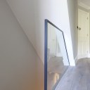 Kentish Town / Glass stair banister