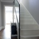 Kentish Town / Staircase glass banister and storage