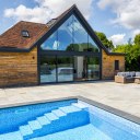 Catslands Farmhouse Annex / External view by swimming pool