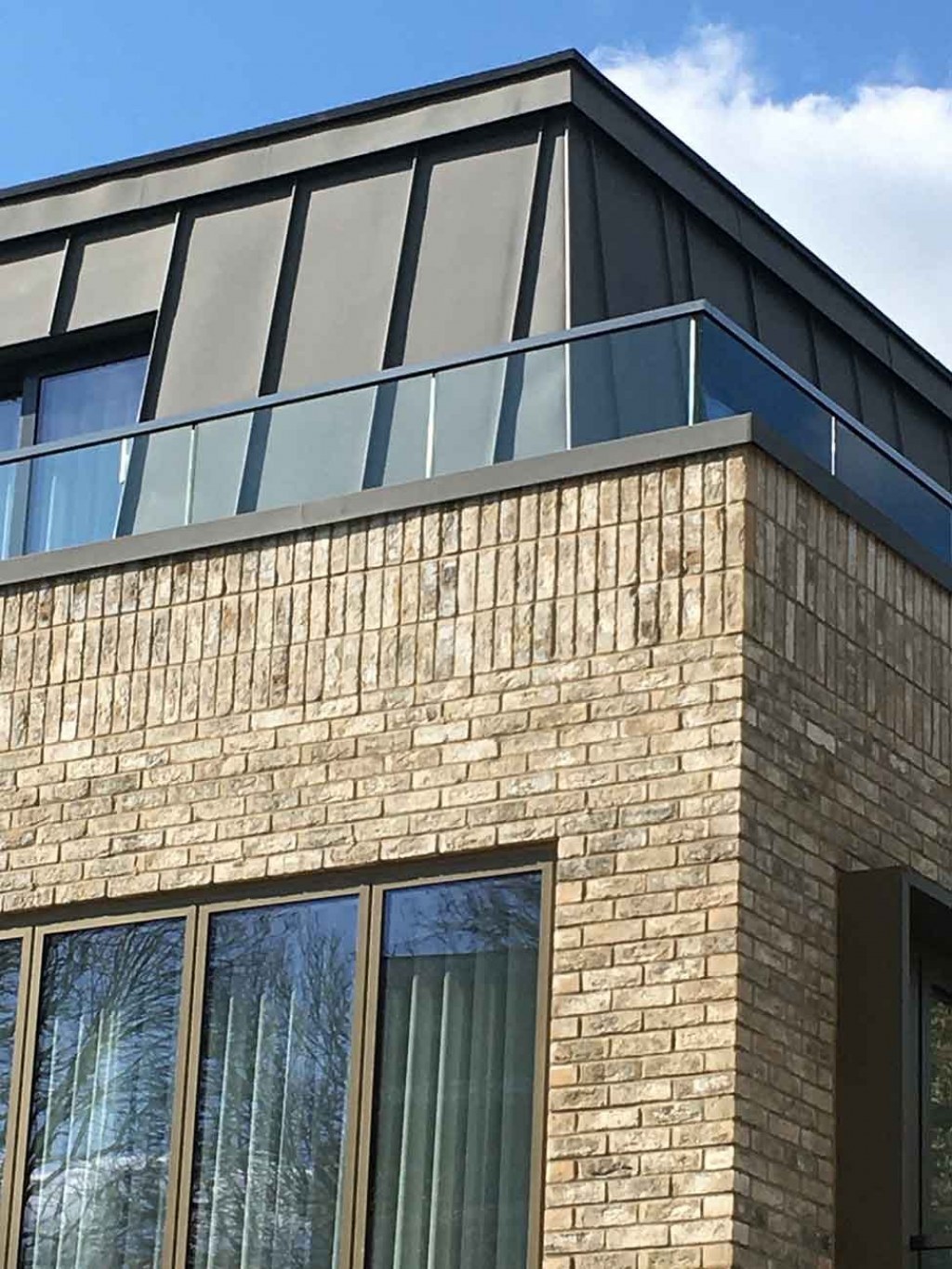 New Build Apartments / Mansard roof and brickwork detail