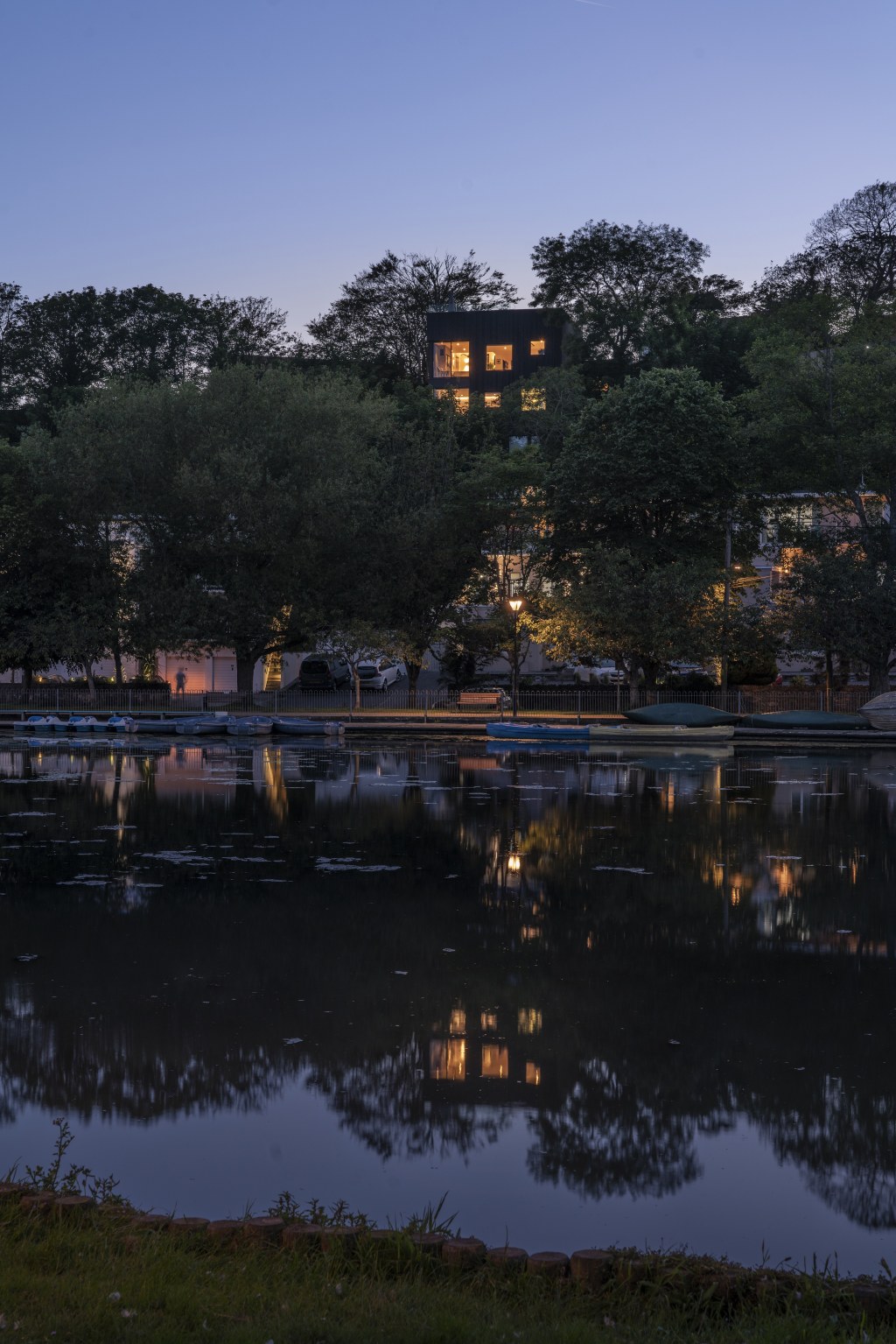 House in the Trees / Dusk from across Lake