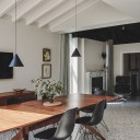 Rees Architects | Aldersbrook / Aldersbrook | The ceilings define different parts of the home: pitched exposed rafters in the the dining space, dark ceilings in the study, and a flat ceiling in the kitchen.