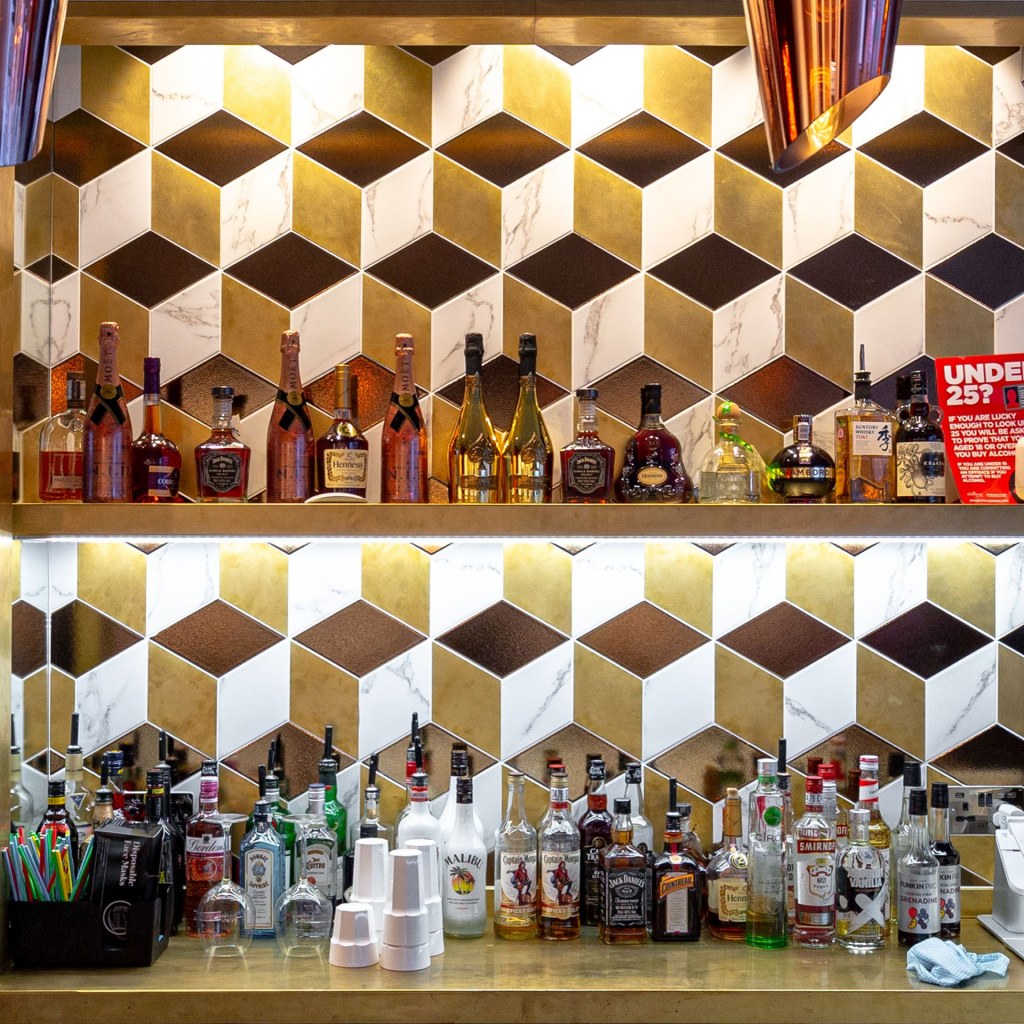 Cococure Cocktail Bar and Nightclub - Aldgate, London. / Bespoke brass tiles