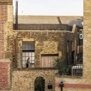 Gin Distillery / The exterior façade has been repaired with a brick patchwork