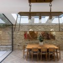 Claylands, Oval / Dining space with exposed brick wall