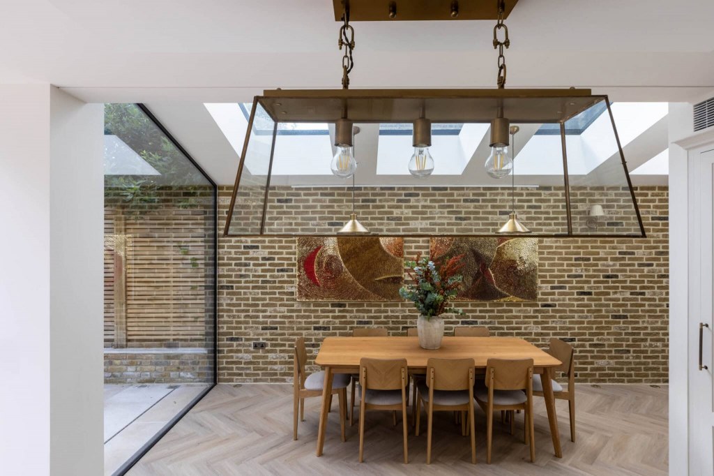 Claylands, Oval / Dining space with exposed brick wall