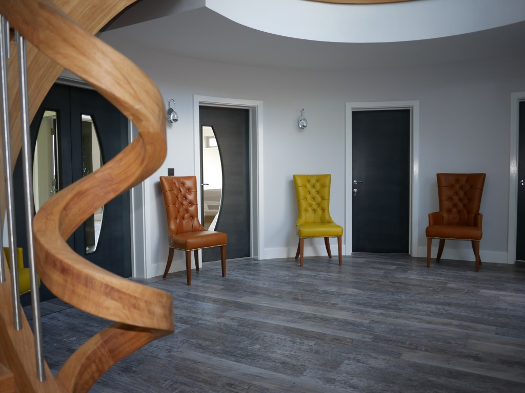 Littleover New Build / Entrance hall with curved first floor landing above