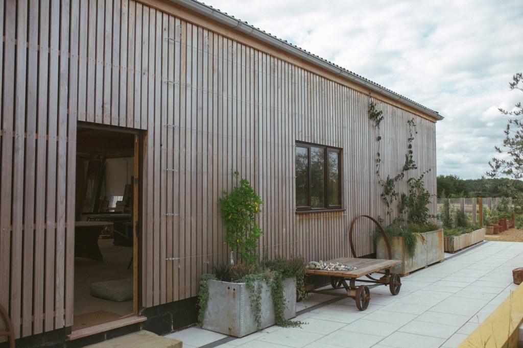 Twin Barn Farm / Agricultural Character For A Modern Site